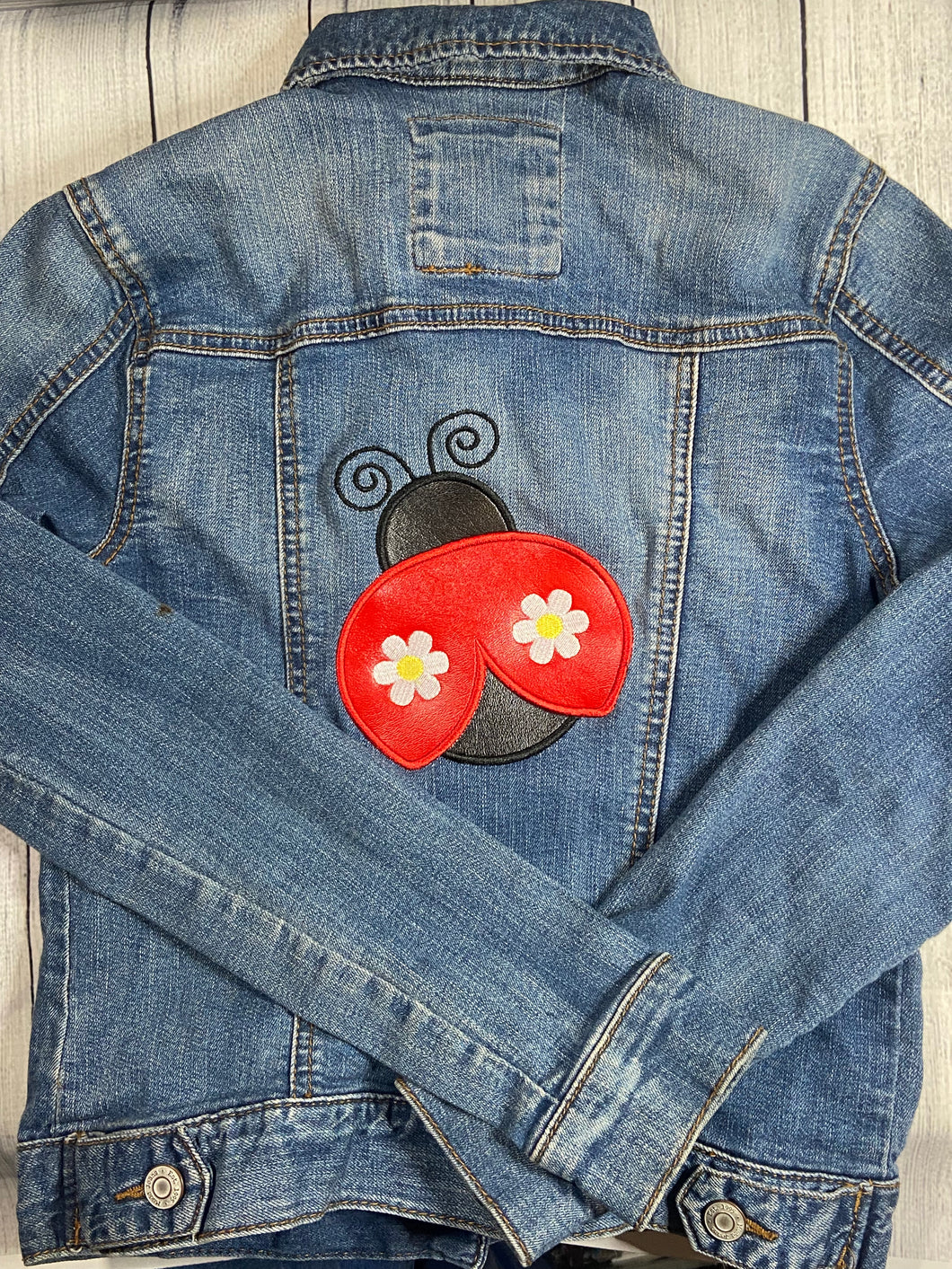 Ladybug Appliqué Up Cycled Denim Jacket (Ladies small)